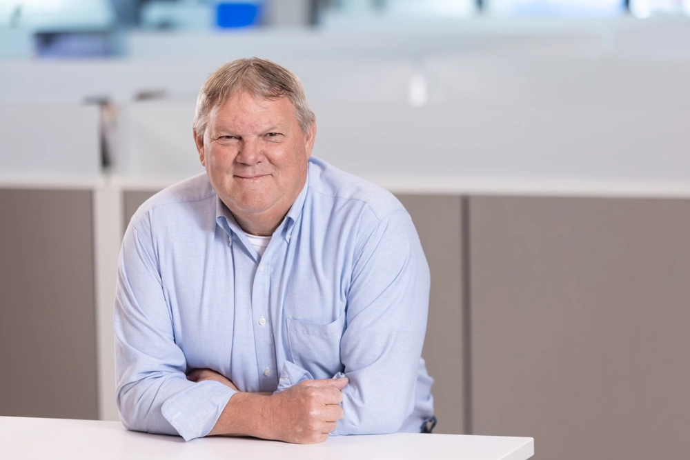 portrait of a smiling person in professional attire